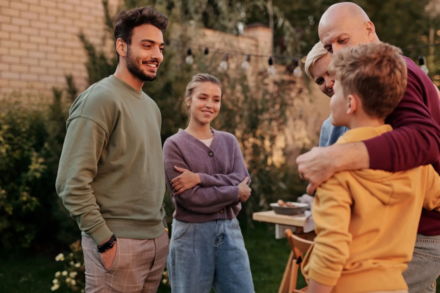 Family sharing a positive moment together during community-based family time
